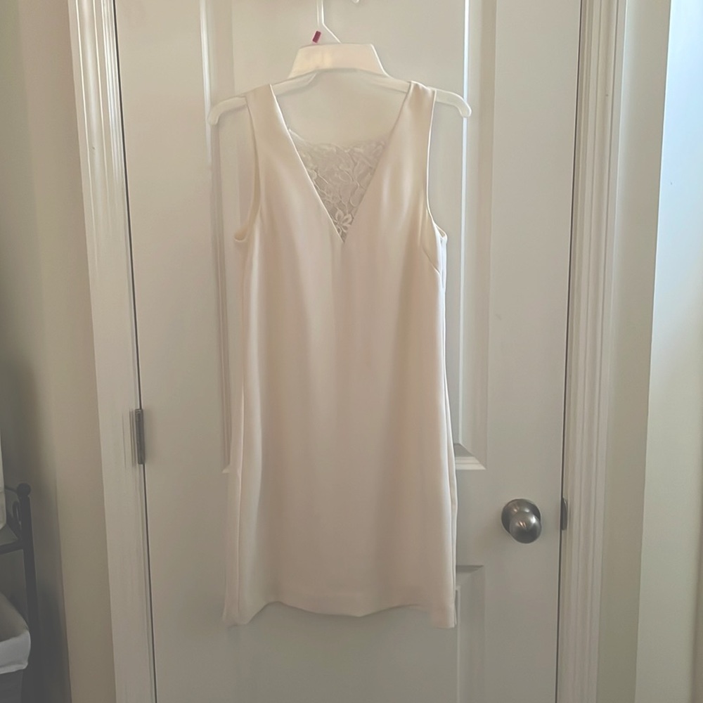 H&M white sleeveless dress with lace V-neck